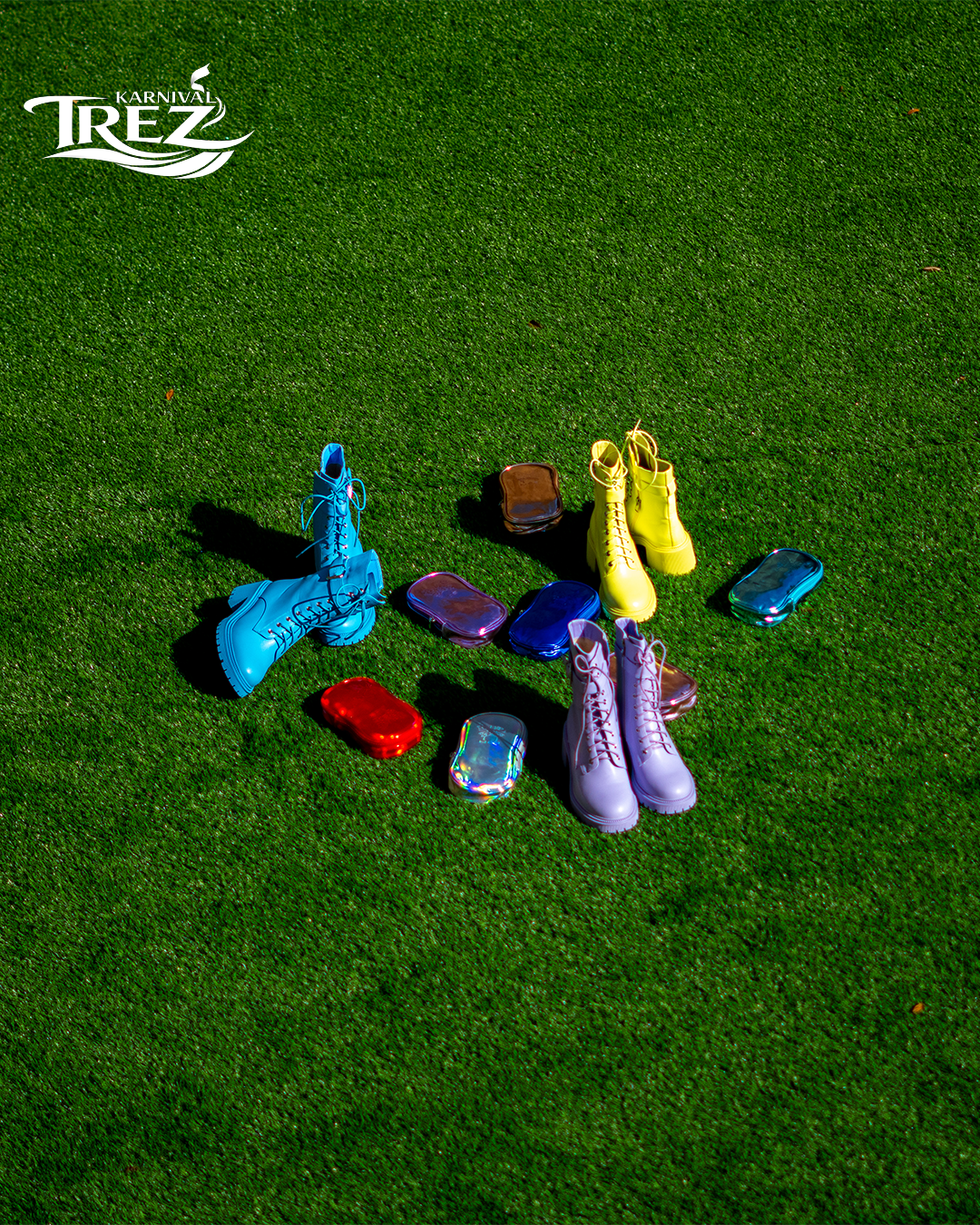 Premium carnival boots and bags on a green lawn
